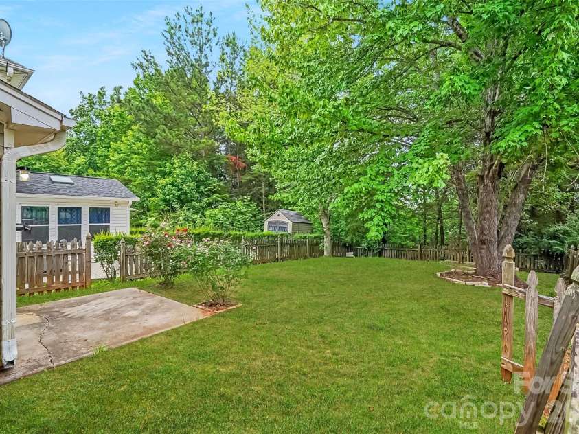 6010 Raisin Tree Lane, Charlotte, NC 28215.  MLS# CAR4394434, YatesRealty ID 31005. Backyard- Enhanced Landscaping 