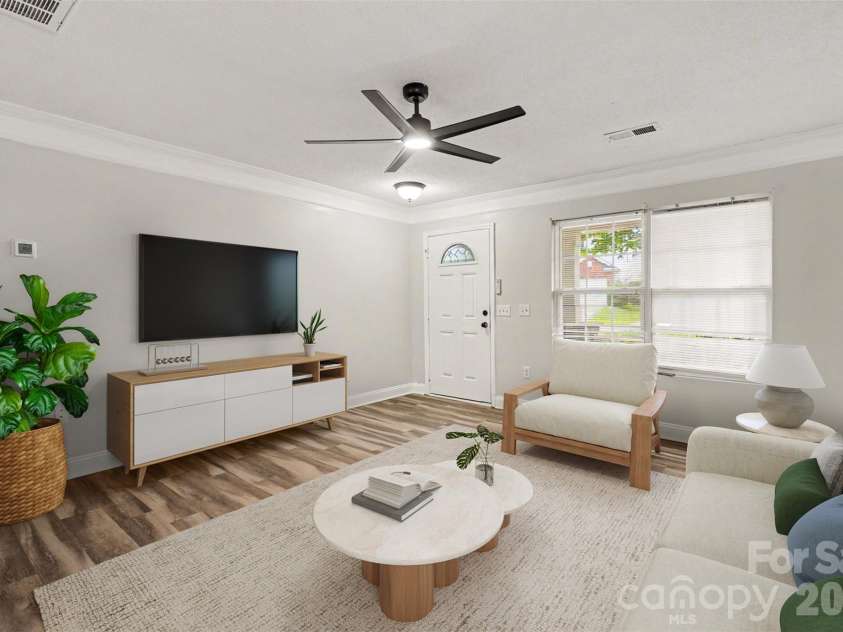 6010 Raisin Tree Lane, Charlotte, NC 28215.  MLS# CAR4394434, YatesRealty ID 31005. Living Room- Virtually Staged