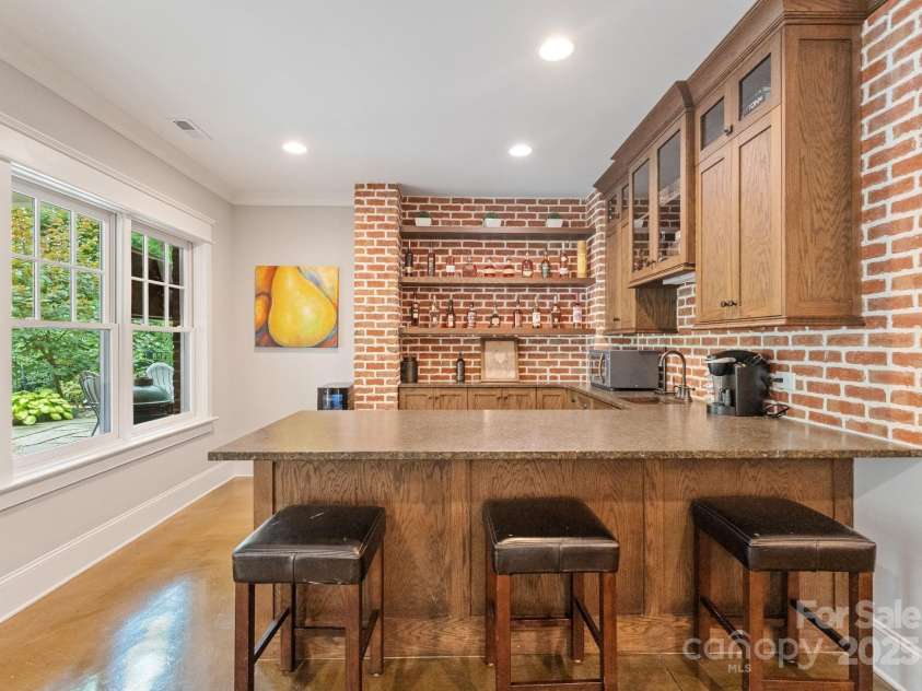 2941 Forest Park Drive, Charlotte, NC 28209.  MLS# CAR4265458, YatesRealty ID 31006. Entertainment area!
