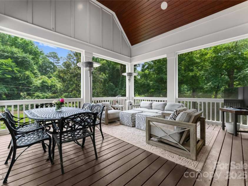 2941 Forest Park Drive, Charlotte, NC 28209.  MLS# CAR4265458, YatesRealty ID 31006. Gorgeous screened-in porch off the Living Room  with vaulted ceilings, room for dining and relaxing!