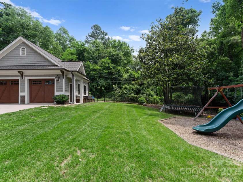 2941 Forest Park Drive, Charlotte, NC 28209.  MLS# CAR4265458, YatesRealty ID 31006. Lots of yard space adjacent to swing set