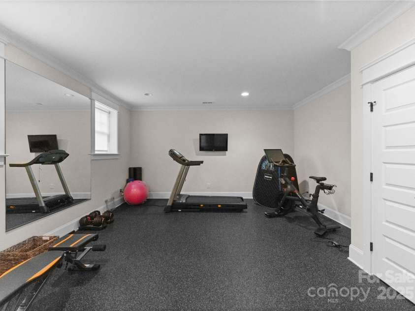 2941 Forest Park Drive, Charlotte, NC 28209.  MLS# CAR4265458, YatesRealty ID 31006. WOW!  Exercise Room on lower level is large and has large storage closet in the lower level
