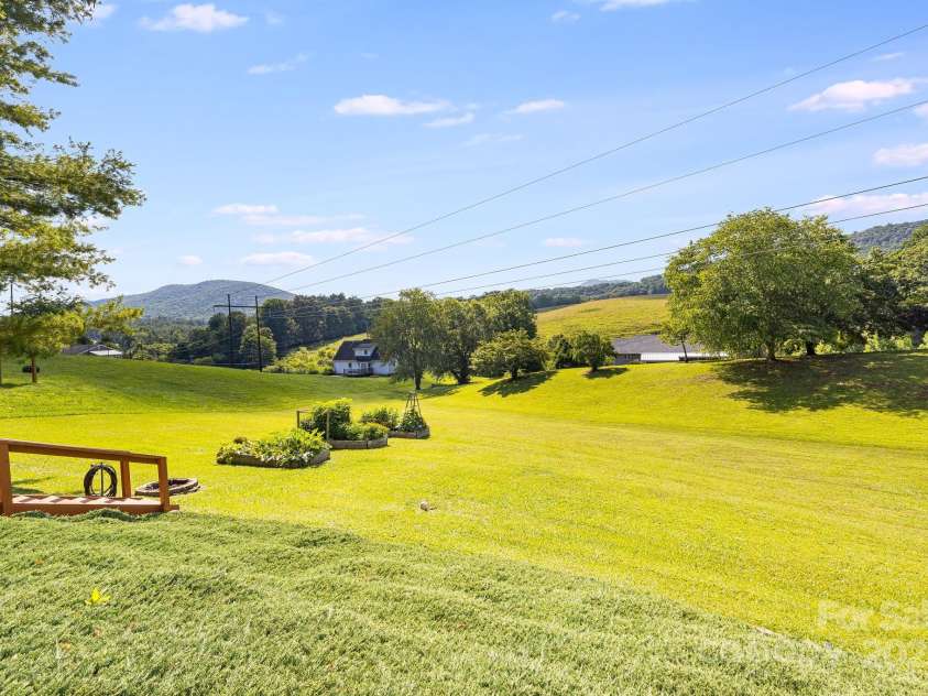 23 Sun Up Lane, Candler, NC 28715.  MLS# CAR4278167, YatesRealty ID 31008. 