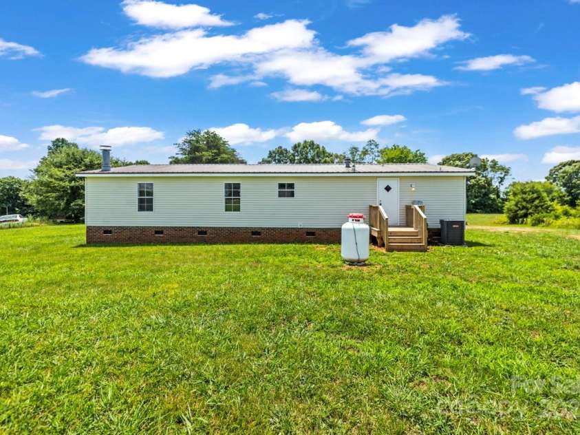 1133 Lynn Lane, Catawba, NC 28609.  MLS# CAR4275480, YatesRealty ID 31010. Rear of home with freshly painted siding