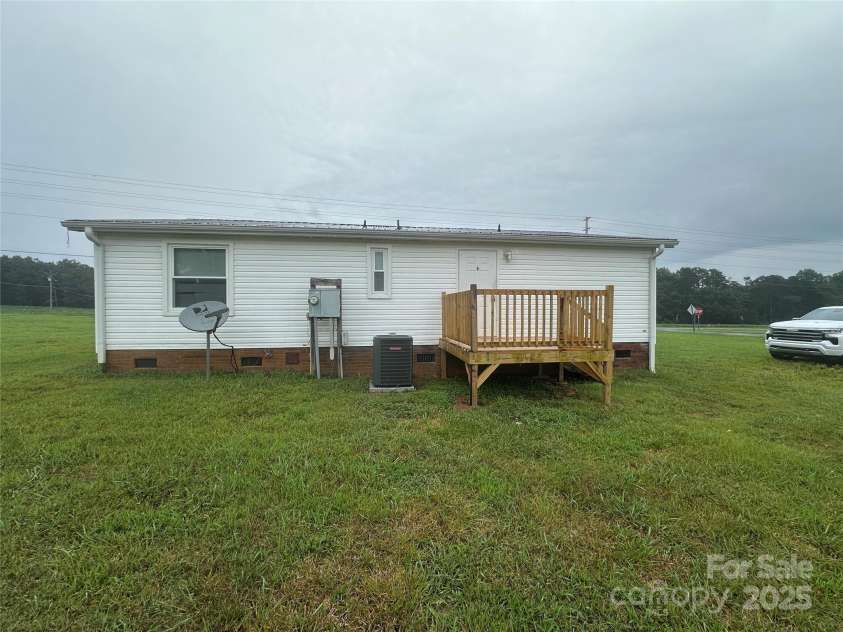 2379 Peeler Road, Vale, NC 28168.  MLS# CAR4288034, YatesRealty ID 31012. Back yard view 