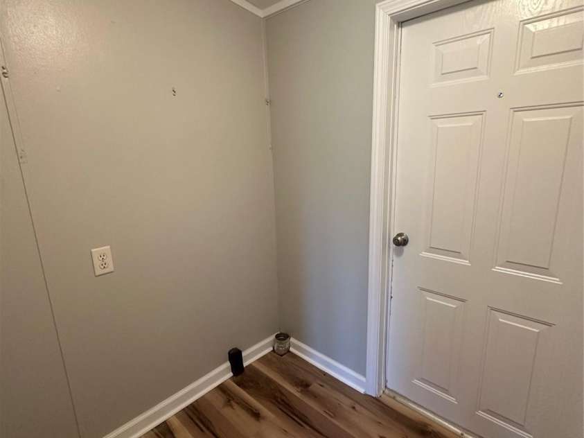2379 Peeler Road, Vale, NC 28168.  MLS# CAR4288034, YatesRealty ID 31012. Laundry room abuts back entry way