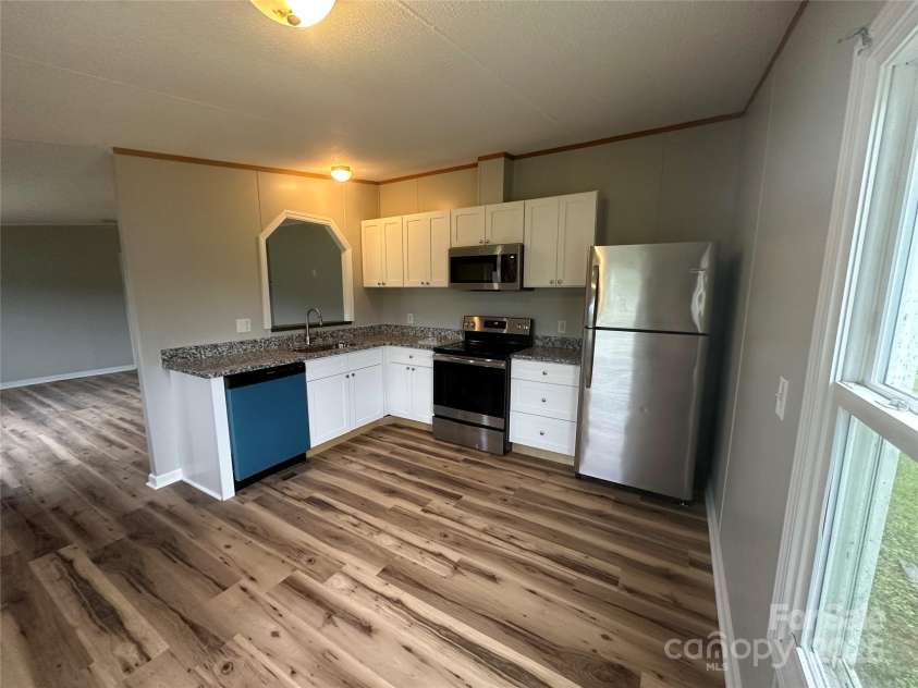 2379 Peeler Road, Vale, NC 28168.  MLS# CAR4288034, YatesRealty ID 31012. Newly renovated kitchen with new appliances that will remain