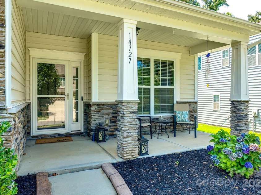14727 Brannock Hills Drive, Charlotte, NC 28278.  MLS# CAR4266580, YatesRealty ID 31016. The front porch has a relaxing feel and is very inviting.