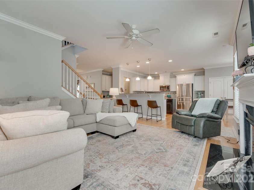 14727 Brannock Hills Drive, Charlotte, NC 28278.  MLS# CAR4266580, YatesRealty ID 31016. The living room area seamlessly transitions to  the large kitchen.