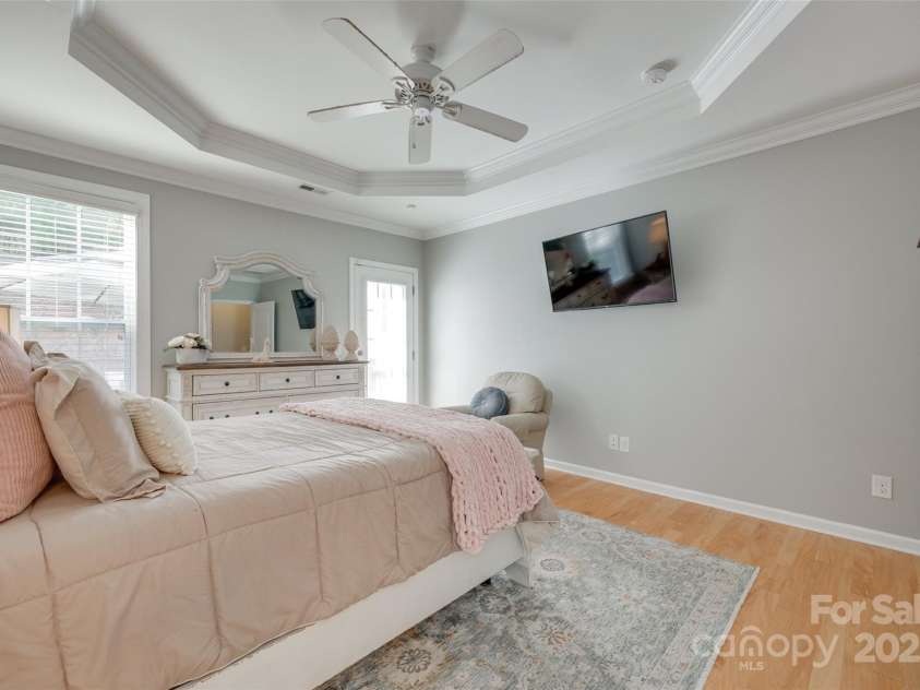 14727 Brannock Hills Drive, Charlotte, NC 28278.  MLS# CAR4266580, YatesRealty ID 31016. The primary bedroom has a private entrance to the back patio space.