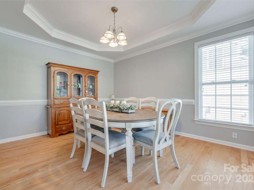 14727 Brannock Hills Drive, Charlotte, NC 28278.  MLS# CAR4266580, YatesRealty ID 31016. The tray ceiling makes this versatile space feel large and full of possibilities.