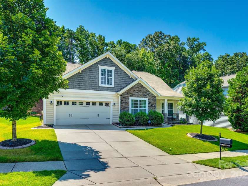 14727 Brannock Hills Drive, Charlotte, NC 28278.  MLS# CAR4266580, YatesRealty ID 31016. The two car garage and large driveway provide ample parking.