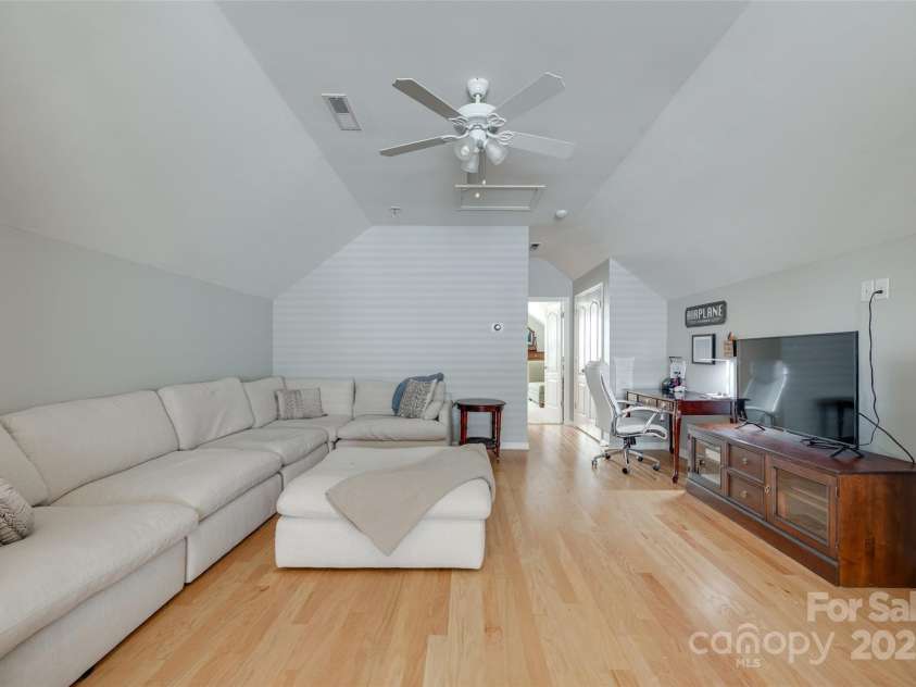 14727 Brannock Hills Drive, Charlotte, NC 28278.  MLS# CAR4266580, YatesRealty ID 31016. The upstairs loft is very spacious with a vaulted ceiling and additional attic storage.