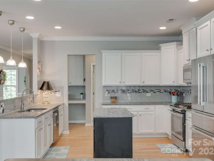 14727 Brannock Hills Drive, Charlotte, NC 28278.  MLS# CAR4266580, YatesRealty ID 31016. There is so much storage in the kitchen with large upper and lower cabinets.