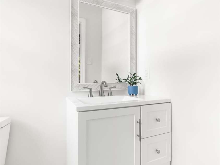 204 Long Creek Road, Bessemer City, NC 28016.  MLS# CAR4284557, YatesRealty ID 31019. Half bath in primary suite