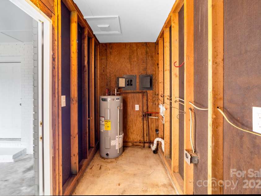 204 Long Creek Road, Bessemer City, NC 28016.  MLS# CAR4284557, YatesRealty ID 31019. Laundry/Storage Closet with new hot water heater