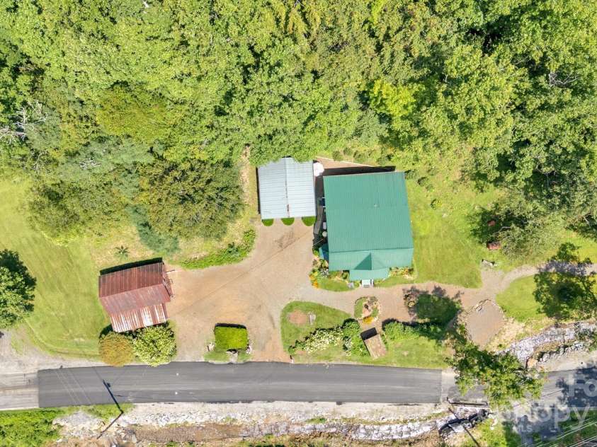 665 Upper Pig Pen Road, Green Mountain, NC 28740.  MLS# CAR4283840, YatesRealty ID 31020. 