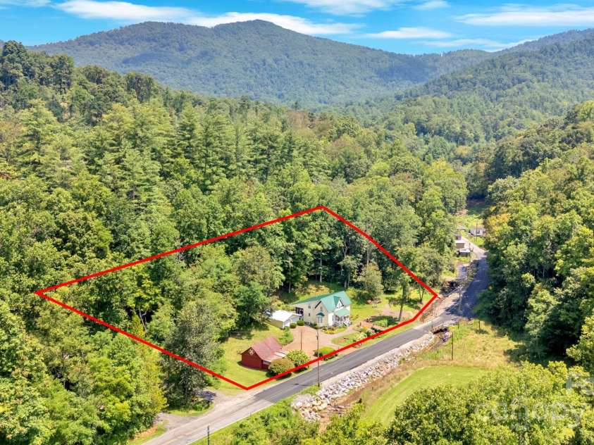 665 Upper Pig Pen Road, Green Mountain, NC 28740.  MLS# CAR4283840, YatesRealty ID 31020. 