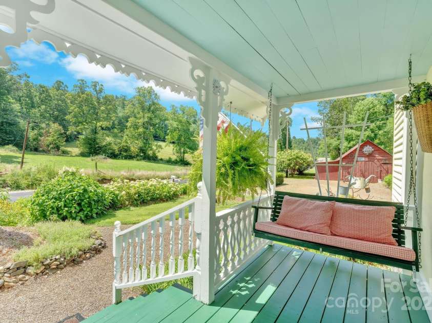 665 Upper Pig Pen Road, Green Mountain, NC 28740.  MLS# CAR4283840, YatesRealty ID 31020. Front Porch