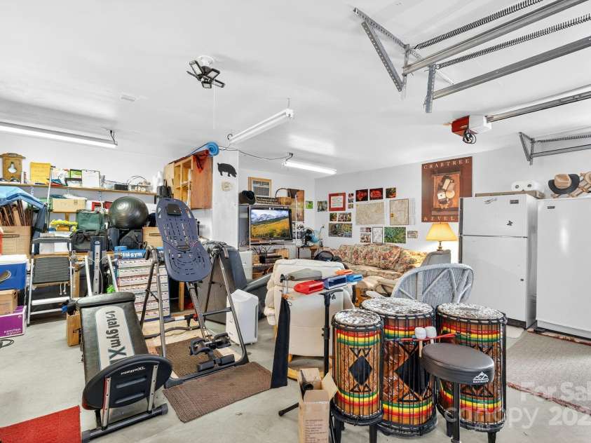 665 Upper Pig Pen Road, Green Mountain, NC 28740.  MLS# CAR4283840, YatesRealty ID 31020. Garage