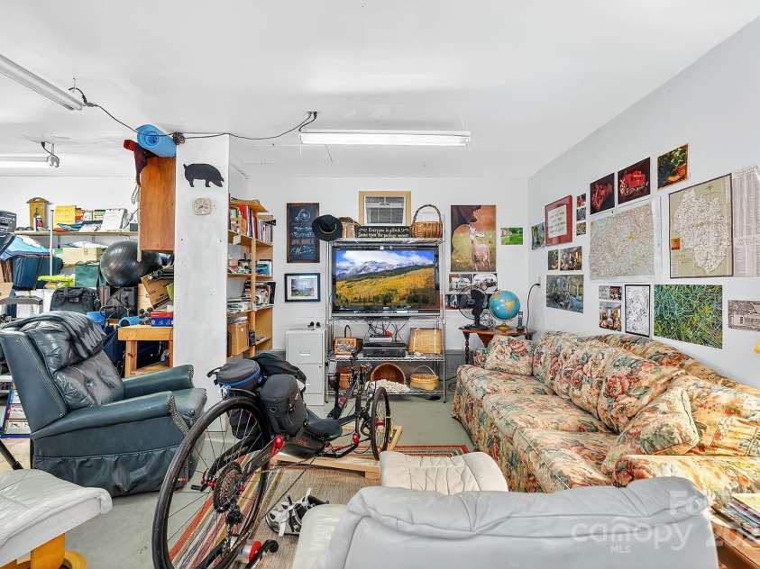 665 Upper Pig Pen Road, Green Mountain, NC 28740.  MLS# CAR4283840, YatesRealty ID 31020. Garage