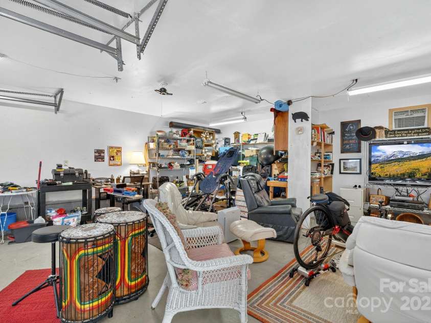 665 Upper Pig Pen Road, Green Mountain, NC 28740.  MLS# CAR4283840, YatesRealty ID 31020. Garage