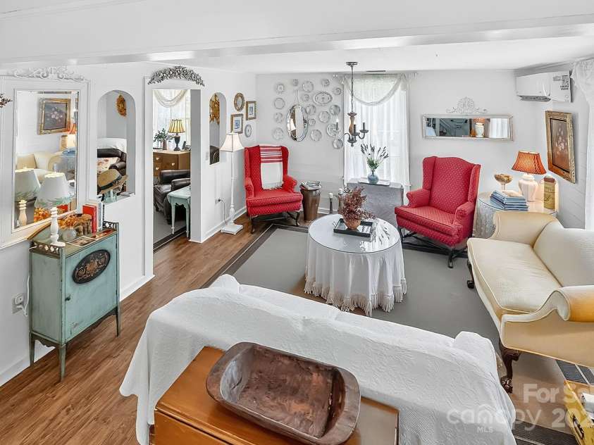 665 Upper Pig Pen Road, Green Mountain, NC 28740.  MLS# CAR4283840, YatesRealty ID 31020. Living Room