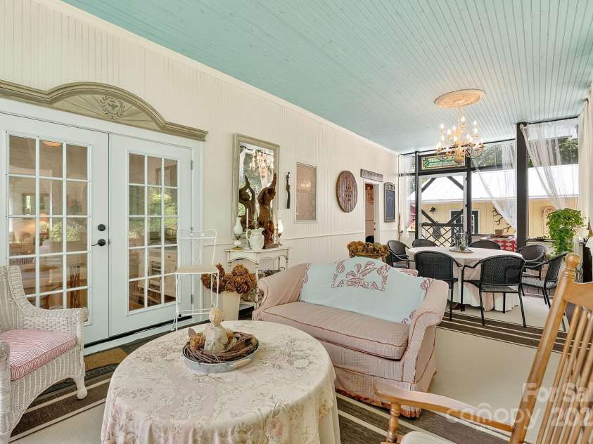 665 Upper Pig Pen Road, Green Mountain, NC 28740.  MLS# CAR4283840, YatesRealty ID 31020. Screened in porch