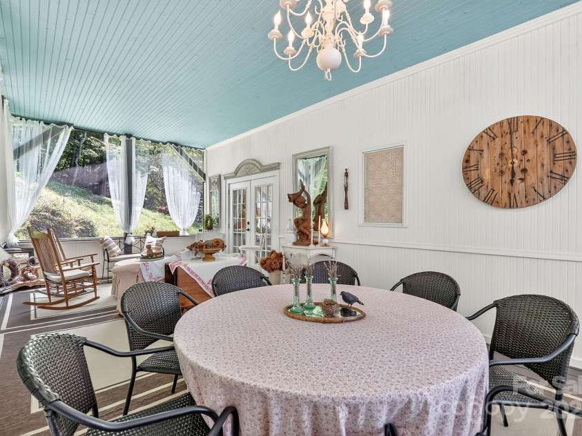 665 Upper Pig Pen Road, Green Mountain, NC 28740.  MLS# CAR4283840, YatesRealty ID 31020. Screened in porch