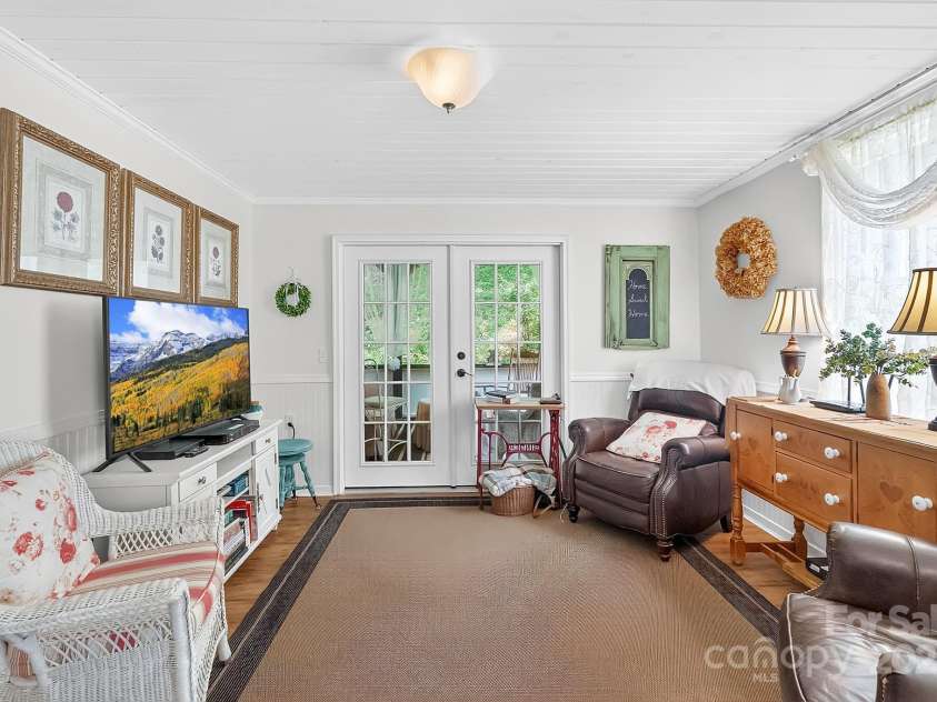 665 Upper Pig Pen Road, Green Mountain, NC 28740.  MLS# CAR4283840, YatesRealty ID 31020. Sitting Room