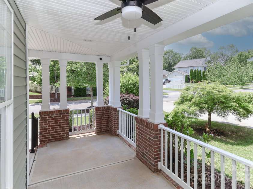 15630 Sagefield Drive, Huntersville, NC 28078.  MLS# CAR4279770, YatesRealty ID 31025. Classic wraparound porch for morning coffee or evening chats.