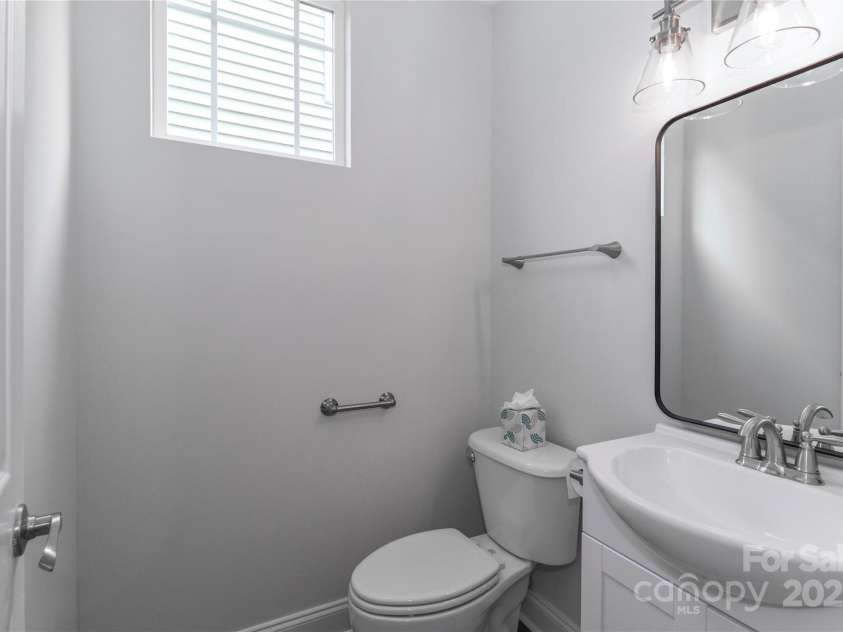 15630 Sagefield Drive, Huntersville, NC 28078.  MLS# CAR4279770, YatesRealty ID 31025. Convenient half bath for guests and quick freshening up.