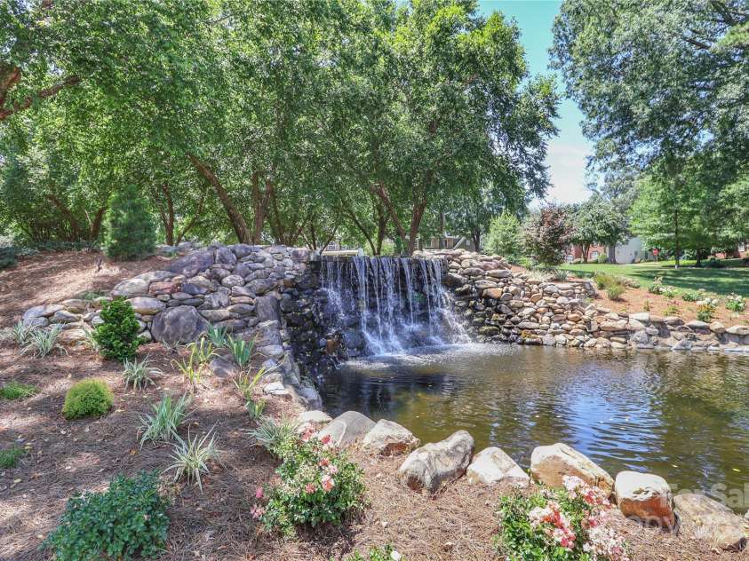 15630 Sagefield Drive, Huntersville, NC 28078.  MLS# CAR4279770, YatesRealty ID 31025. Enjoy picnics under the shade near this waterfall!