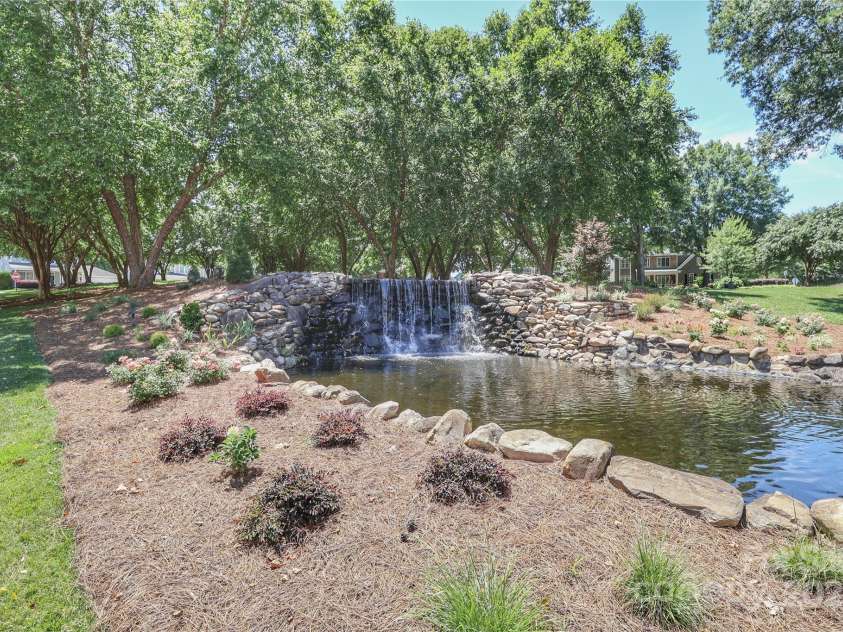 15630 Sagefield Drive, Huntersville, NC 28078.  MLS# CAR4279770, YatesRealty ID 31025. Well-maintained playgrounds nestled among shady trees!