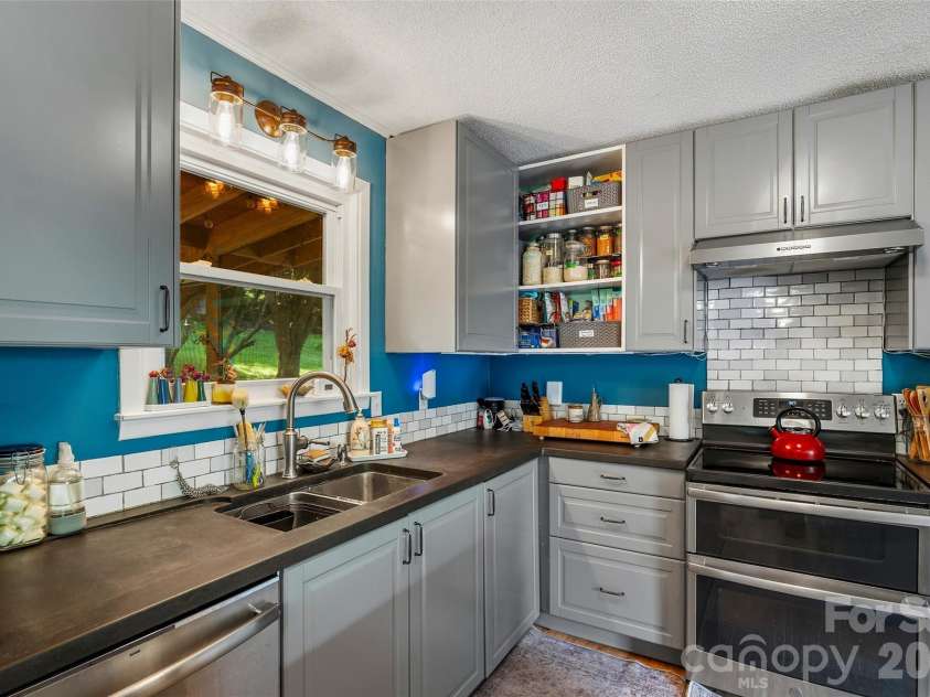 1574 Cashiers Valley Road, Brevard, NC 28712.  MLS# CAR4394169, YatesRealty ID 31027. 