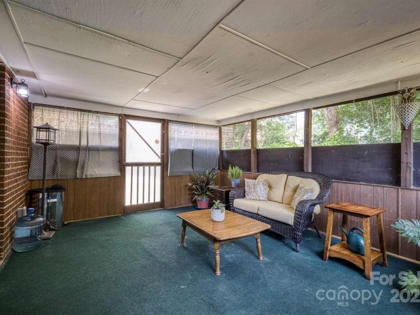 214 Howard Street, Morganton, NC 28655.  MLS# CAR4284499, YatesRealty ID 31028. Screened-in porch