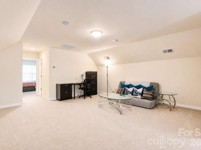 2412 Hamlet Court, Matthews, NC 28105.  MLS# CAR4394300, YatesRealty ID 31028. Loft space on third floor