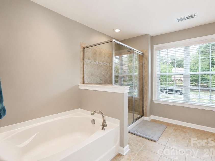 2412 Hamlet Court, Matthews, NC 28105.  MLS# CAR4394300, YatesRealty ID 31028. Primary Bathroom
