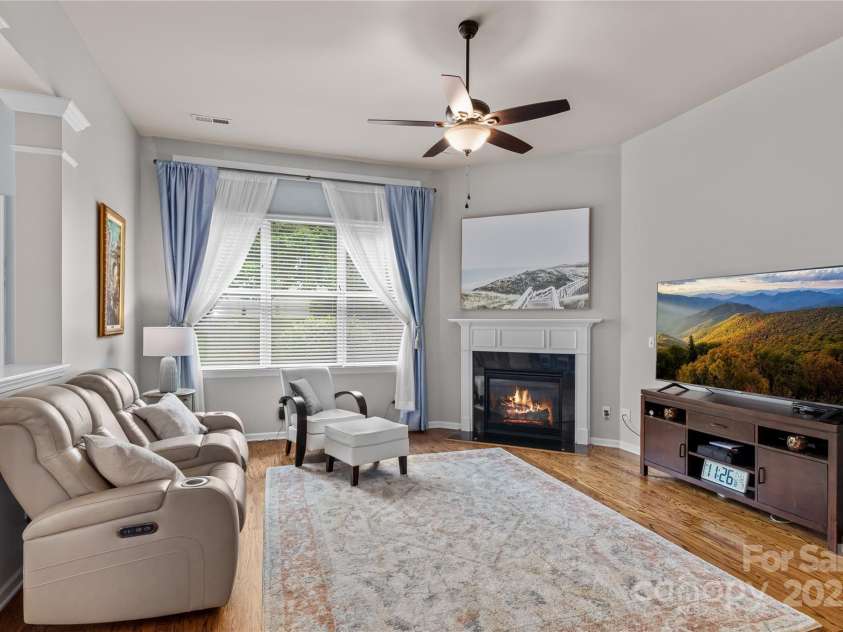 17311 Lake Path Drive, Cornelius, NC 28031.  MLS# CAR4284922, YatesRealty ID 31030. Family room with gas log fireplace