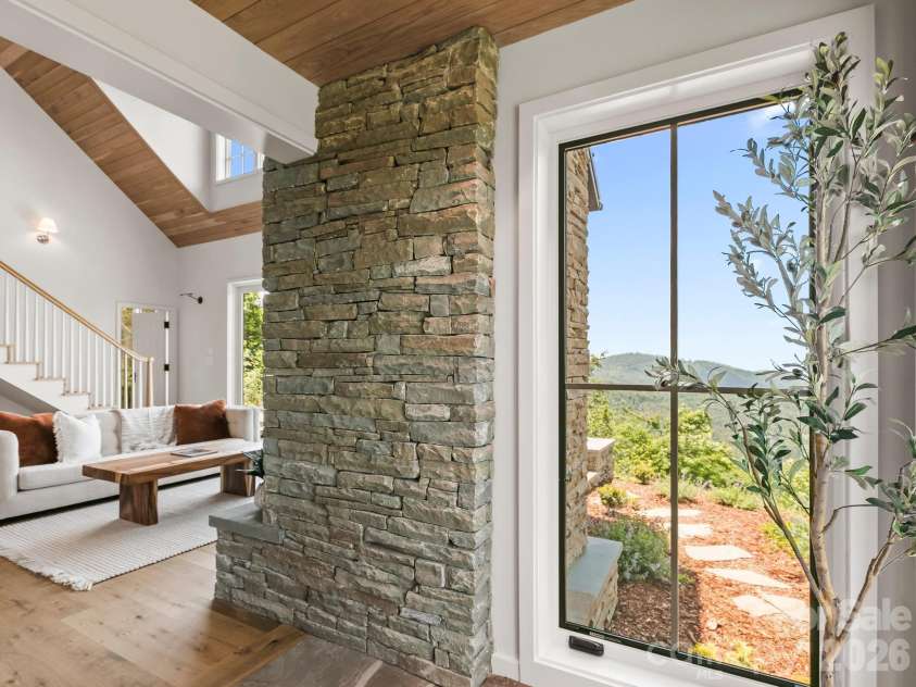 41 Windy Ridge Trail, Asheville, NC 28804.  MLS# CAR4387701, YatesRealty ID 31031. Wraparound Fireplace