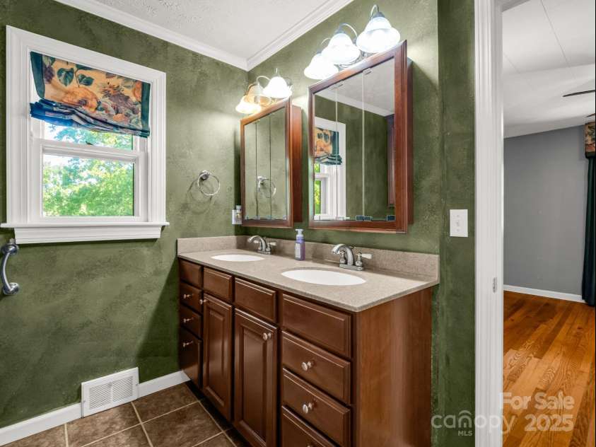 430 Mag Sluder Road, Alexander, NC 28701.  MLS# CAR4286393, YatesRealty ID 31033. Double Sink w/Corian Countertops