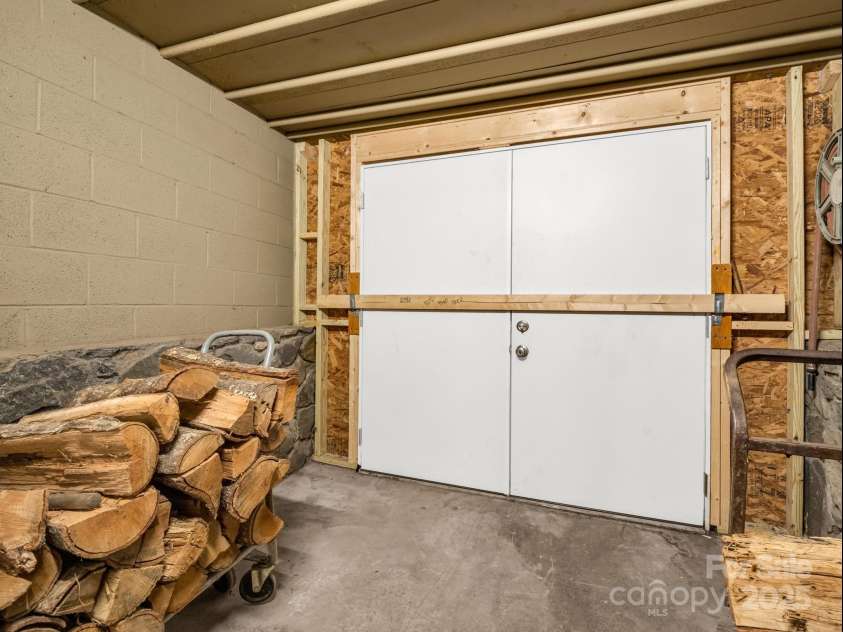 430 Mag Sluder Road, Alexander, NC 28701.  MLS# CAR4286393, YatesRealty ID 31033. Exteror Garage Entrance/Exit