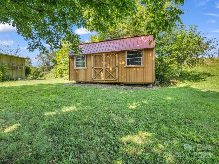 430 Mag Sluder Road, Alexander, NC 28701.  MLS# CAR4286393, YatesRealty ID 31033. Large Storage Shed