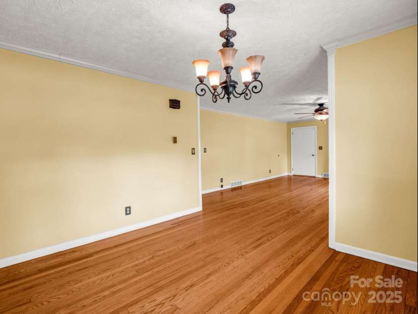 430 Mag Sluder Road, Alexander, NC 28701.  MLS# CAR4286393, YatesRealty ID 31033. Open Living/Dining Room