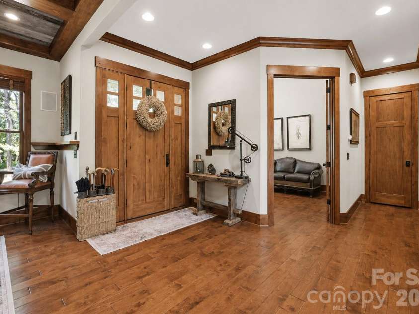 9208 Flying Eagle Lane, Charlotte, NC 28278.  MLS# CAR4397874, YatesRealty ID 31033. Entrance with Office on left Dining on right