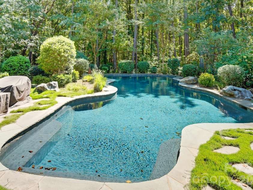 9208 Flying Eagle Lane, Charlotte, NC 28278.  MLS# CAR4397874, YatesRealty ID 31033. Ionic & Salt Water Inground Pool with Waterfalls