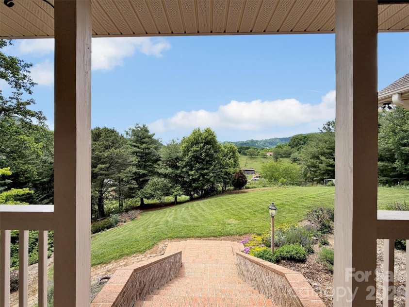 99 Mary Gray Drive, Clyde, NC 28721.  MLS# CAR4389889, YatesRealty ID 31036. Beautiful Views