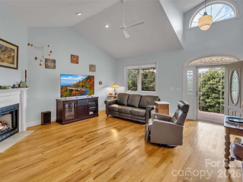 99 Mary Gray Drive, Clyde, NC 28721.  MLS# CAR4389889, YatesRealty ID 31036. Bright & Sunny Great Room