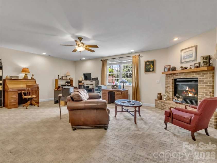 99 Mary Gray Drive, Clyde, NC 28721.  MLS# CAR4389889, YatesRealty ID 31036. Lower Level Family Room