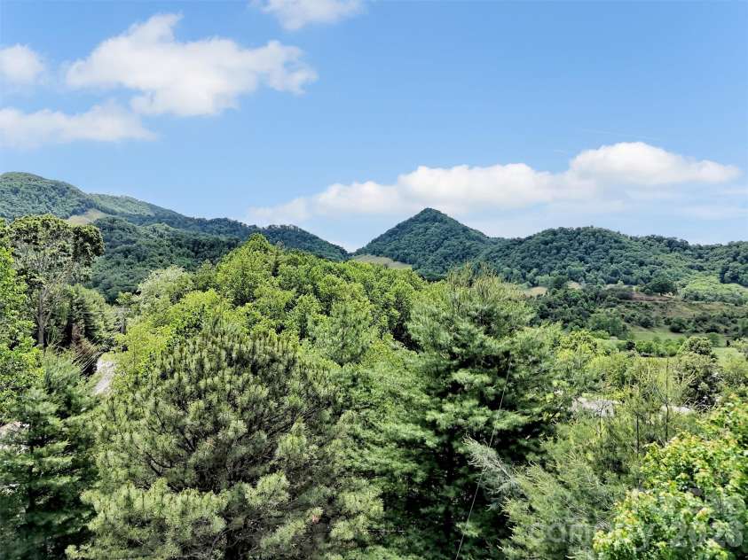 99 Mary Gray Drive, Clyde, NC 28721.  MLS# CAR4389889, YatesRealty ID 31036. Surrounded by Views!